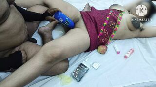 Inserting bottle banana into Indian girl pussy